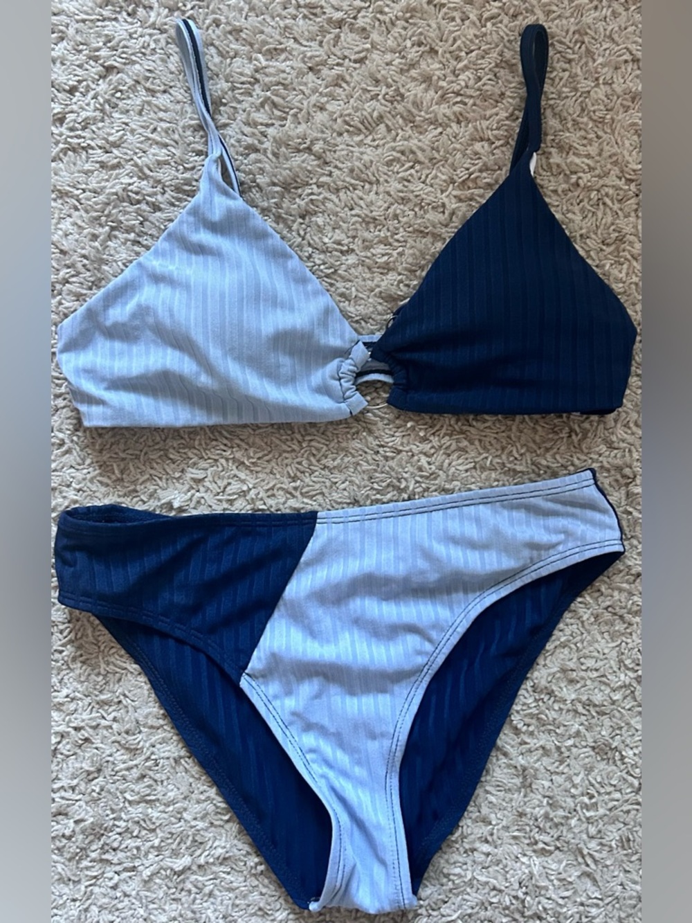 Women’s light and dark blue bikini set.